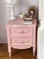 Aesthetic European princess-style pink and white carved wooden bedside table